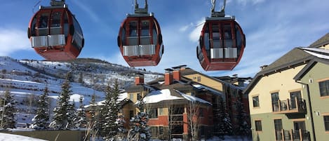 Property in the background, gondola and slope in the foreground