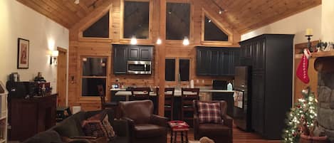 Great room- 10 person dining table, living area w/fireplace and kitchen
