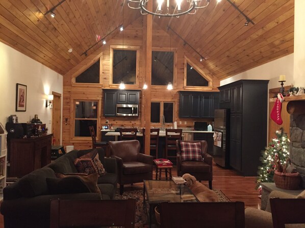Great room- 10 person dining table, living area w/fireplace and kitchen
