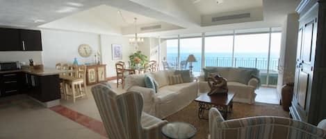 Spacious living and dining room directly on the beachfront.