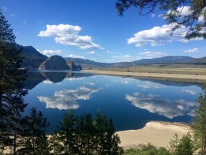 Clear day in September with glassy-mirror water