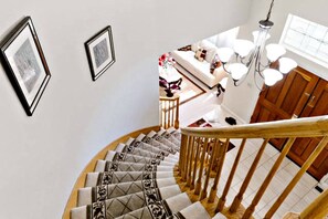 Curved stairs leading to second floor