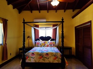 Queen-sized, hand carved teak, four poster, canopy bed