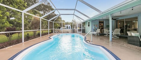 Enjoy the screened-in, heated swimming pool (heated seasonally).  