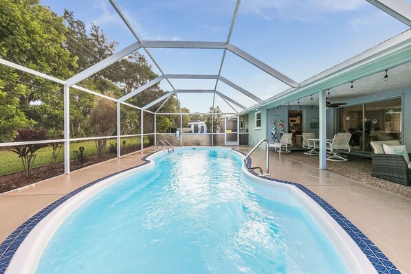 Enjoy the screened-in, heated swimming pool (heated seasonally).  