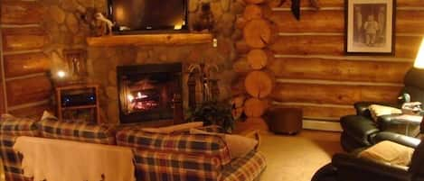 Family room with fireplace and flatscreen TV