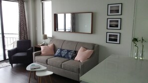 View the sunrise, giant tv and quartz counter tops from this sofa! :)
