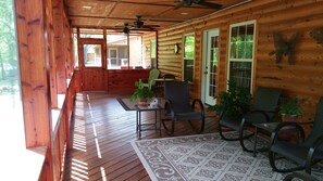 Forty foot screened back porch with cedar wrap.