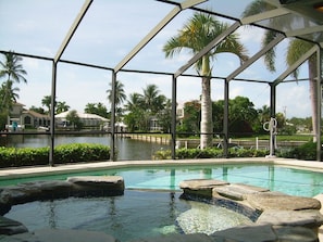 Large, enclosed pool and spa with waterview