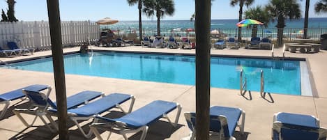 Sitting at the Club House Pool overlooking the Beach itself 