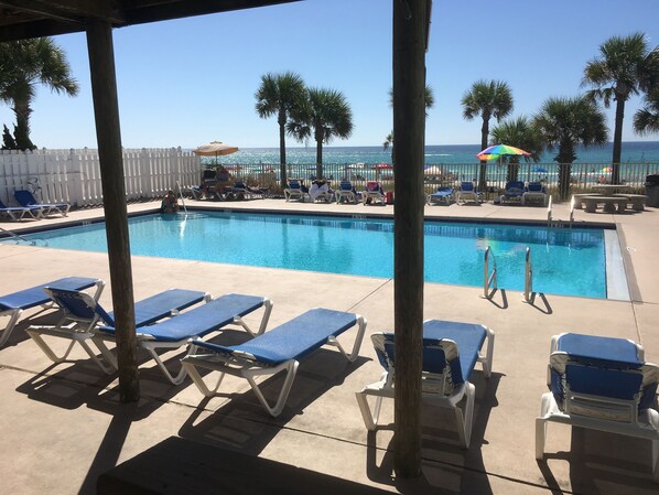 Sitting at the Club House Pool overlooking the Beach itself 