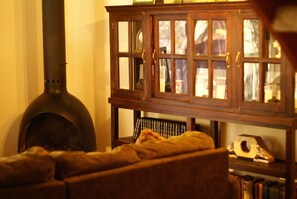Watch the snow fall outside and enjoy a cozy fire from the swedish stove