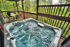 Soak away all your worries in the hot tub on the main level back deck. 