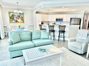 Living Room features a sleeper sofa couch and two recliners.