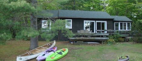 Cottage from dock, southern exposure. Sunny decks. Canoe, kayaks included.