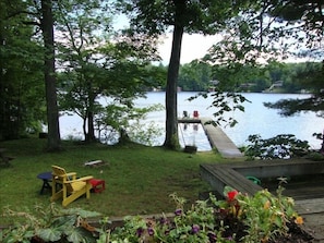Firepit, Lake Muskoka and dock as seen from deck, facing south.