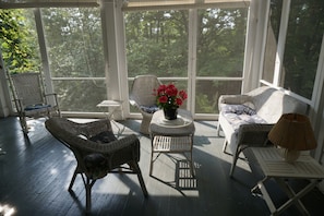 Relax on the peaceful screen porch while listening to the birds and creek.