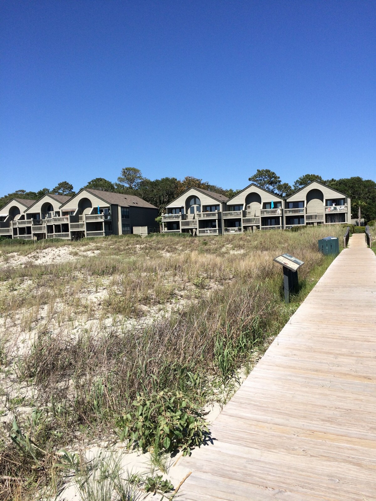 SEE DOLPHINS IN THE MORNING, & SUNSETS FROM THE DECK OF THIS VILLA AT THE BEACH.