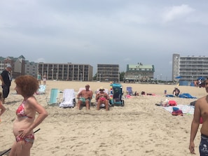 Our condo left of green roof building (lower right unit) from beach 