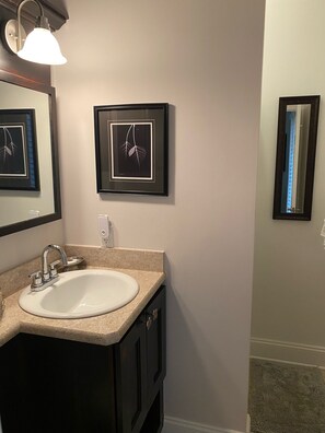 Upstairs bathroom with shower