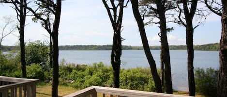 Relax on the back deck and take in the views of the pond.