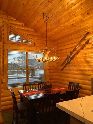 Dining room seating for six, deck/hot tub, view of mountain 