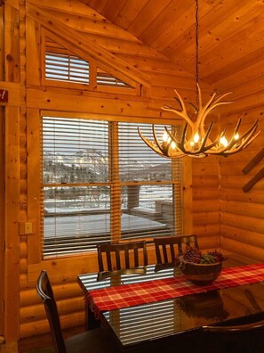 Dining room seating for six, deck/hot tub, view of mountain 
