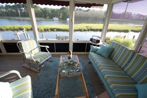 Porch sitting area with vast water views