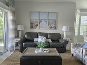 Comfortable furnishings and coastal decor.