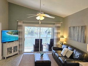 View from the kitchen onto the lanai and the small lake