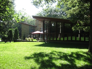 Side view of the guest living room and patio area.  Lots of windows!