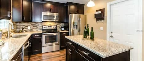 Renovated Kitchen w/ stainless steel appliances