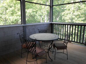Lovely place to dine ...  the screened fireside  porch!