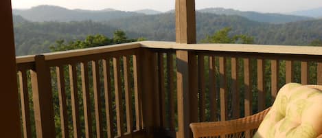 Back balcony porch overlooking the glorious mountains at sunset!