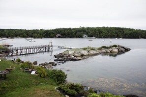 Inner portion of Linekin Bay near high tide.  Public wharf and float on the left