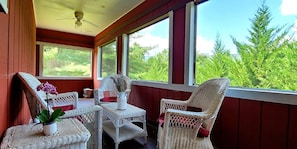 Screened in porch for evening mountain views