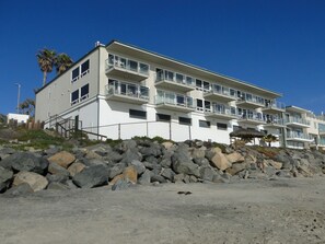 The smaller horizontal window at the bottom is the underground garage.