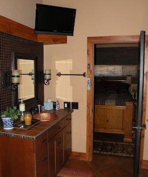Owners Quarters Master Bath with Shower & Jetted Tub and 26' TV.
