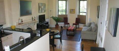 Living dining area. from the windows views of Tremont St and the Boston skyline