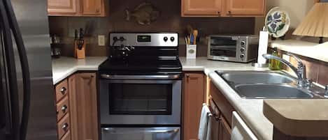Stainless appliances.  Refrigerator, stove and dishwasher.  