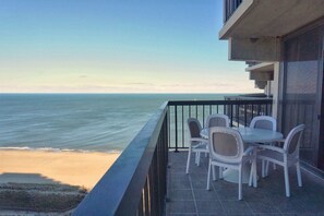 Enjoy a beverage and ocean on your private balcony