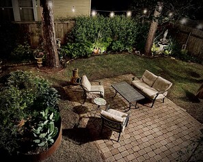 Patio with comfortable seating and hammock