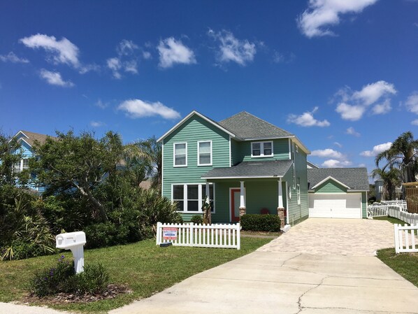 Our new spacious paver driveway & 2 car garage