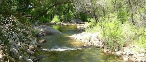 The South Fork of the Kaweah River runs behind the house