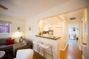 Kitchen with a Granite Bar with Seating for 2 