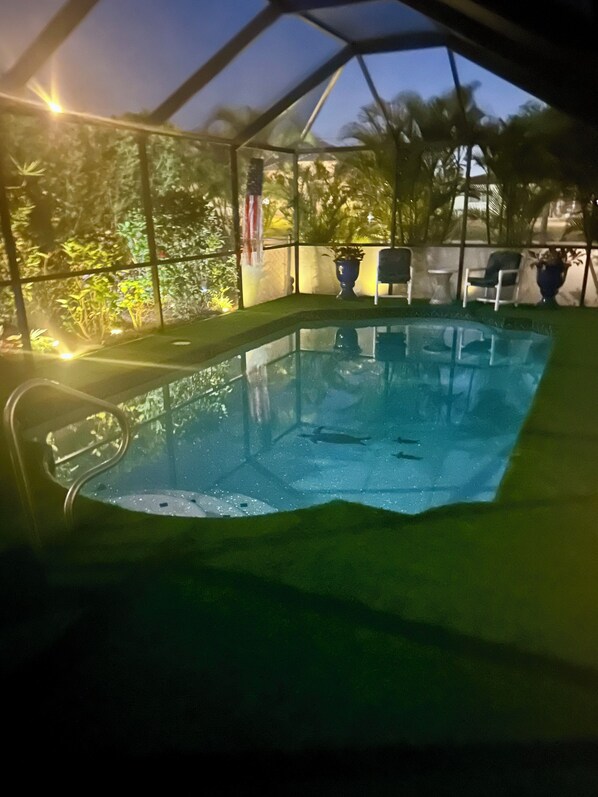Pool and lanai by night