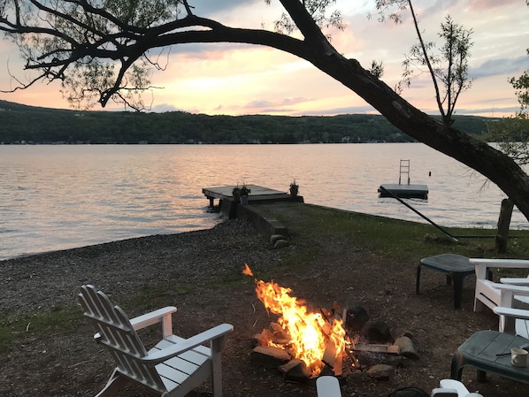 Enjoy amazing sunset views from the fire pit on the shale beach