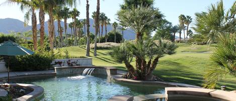 Swimming pool and jacuzzi with outstanding view of mountains and golf course.