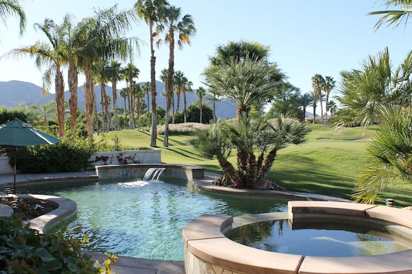 Swimming pool and jacuzzi with outstanding view of mountains and golf course.