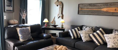 Newly decorated den with view of the beach